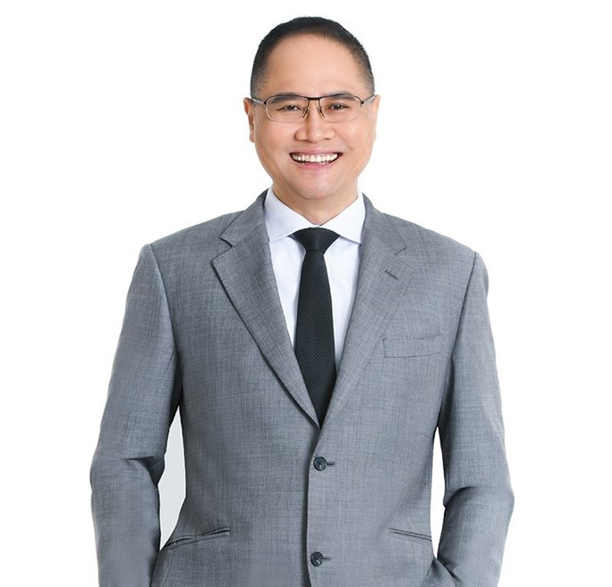 John K E Tan